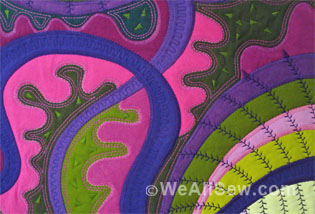 pink - purple - green quilt with decorative stitches
