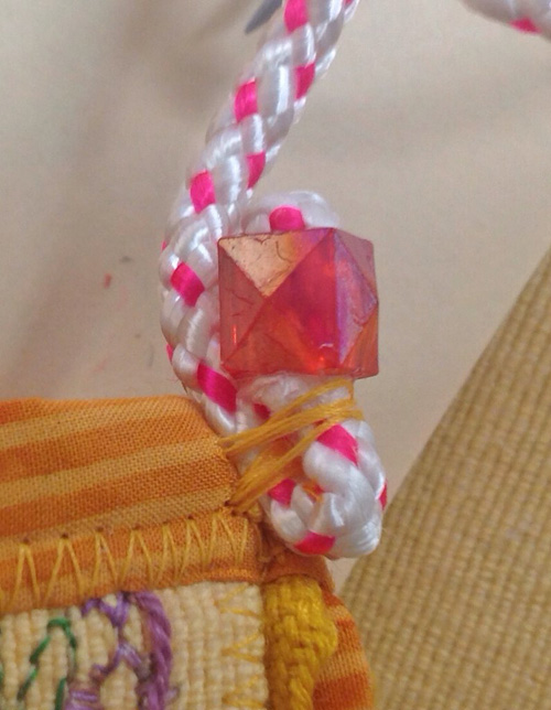 glue large beads in place