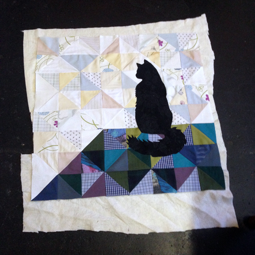 Use temporary spray adhesive on the quilt front