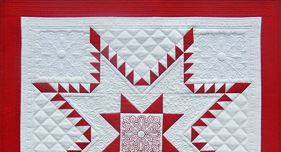 Aurora Feathered Star Quilt