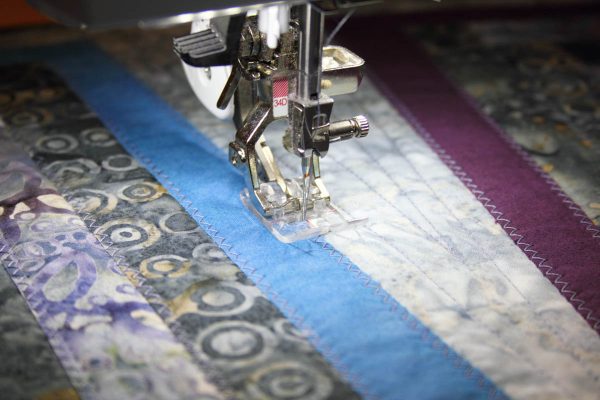 Fused Log Cabin Table Runner Tutorial - zigzag stitch over raw edges