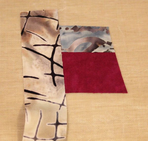 Fused Log Cabin Table Runner Tutorial - Place strip along the left edge of the center square 
