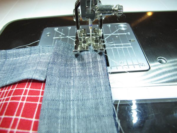 Vinyl Zip Pouch Tutorial - sewing along the top edge of the pouch