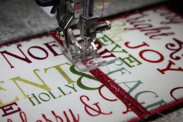 Holiday Fabric Boxes - zigzag stitch between the pannels