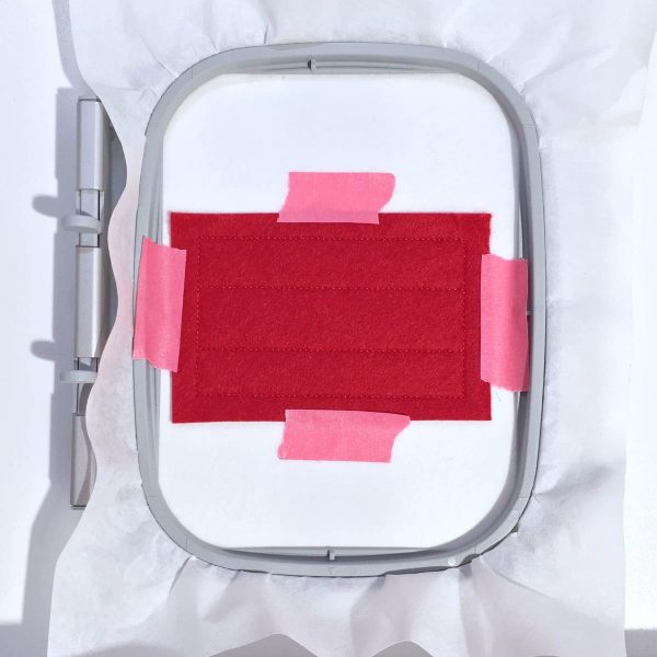 Santa Pants Gift Card Holder Tutorial - Center one piece of red felt over the placement line