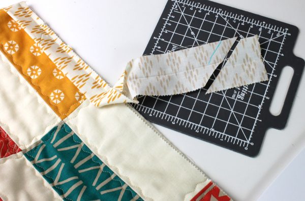 Trim binding ends.