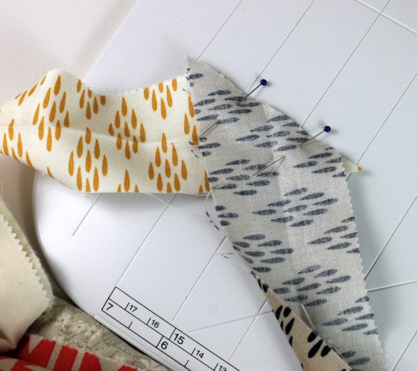 Pin binding ends together.