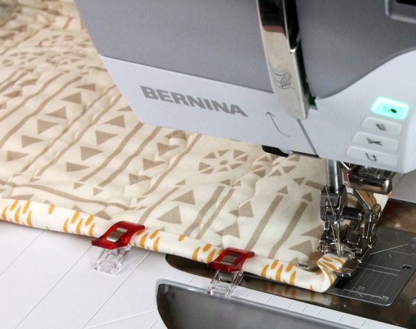 Stitch the binding corner.