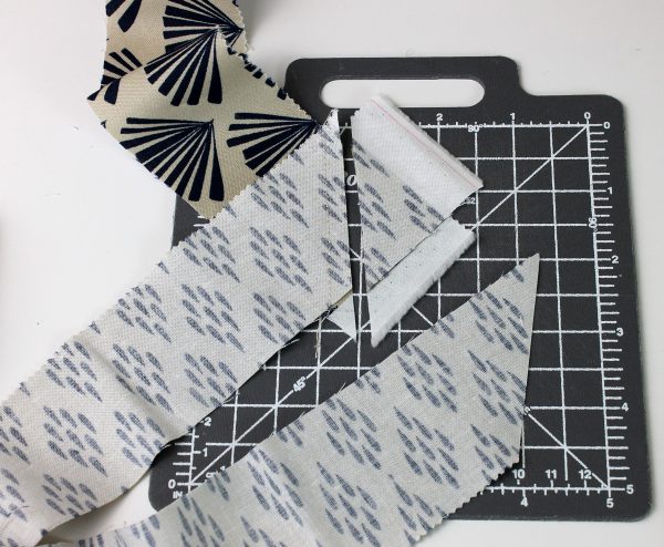 Trim binding seams.