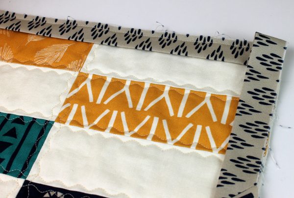 Tuck the binding.