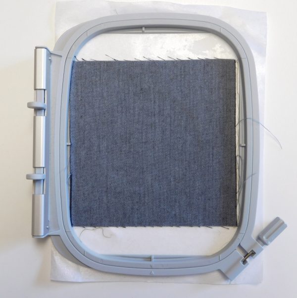 Embroidery hooping tip