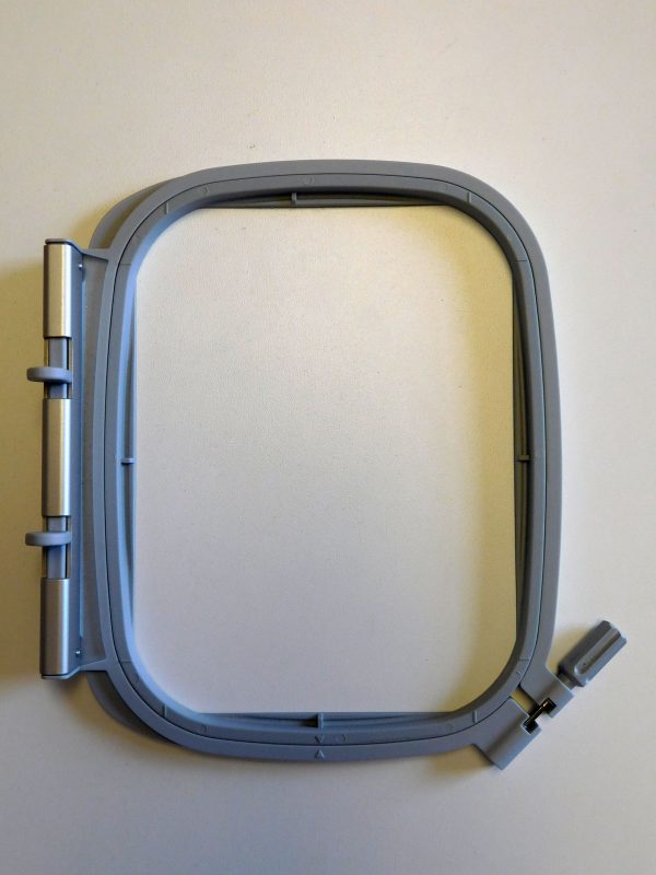Embroidery hooping tip