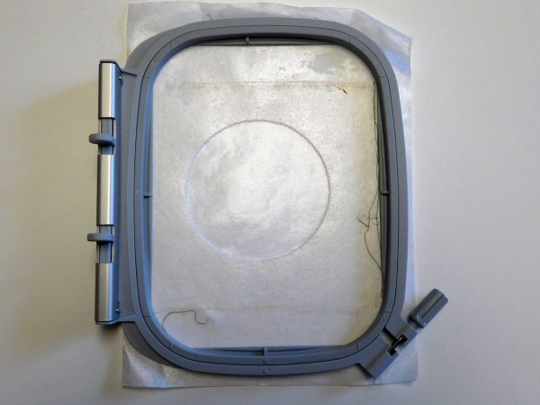Embroidery hooping tip