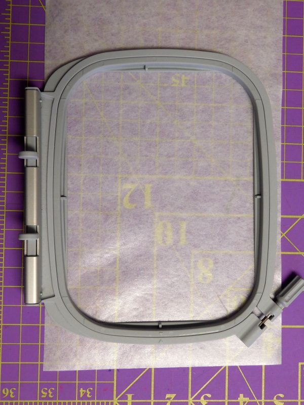 Embroidery hooping tip