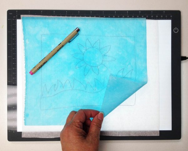 Lightbox for free-stitched hand embroidery on silk technique
