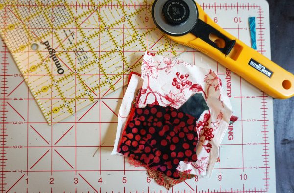 Postage stamp patchwork pillow