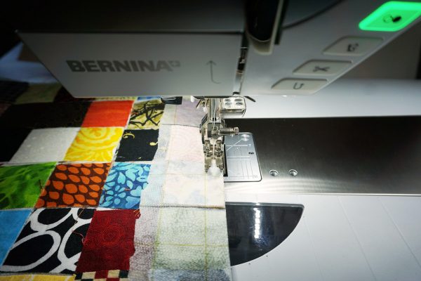 Postage stamp patchwork pillow