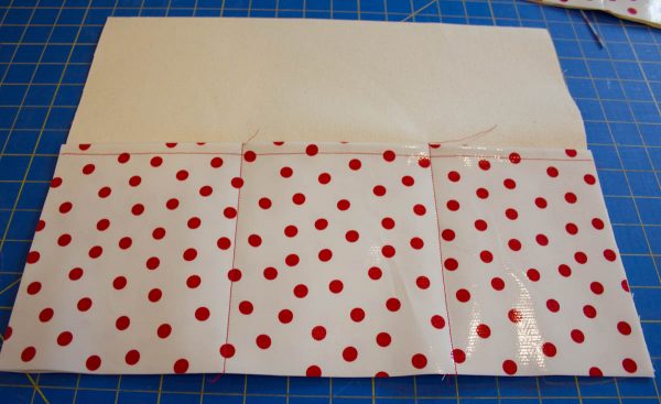 Oilcloth-lined Garden Tote Tutorial - stitch the pocket pieces to the front and back canvas pieces