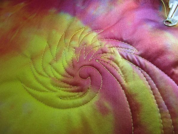 Wholecloth Artquilt Series Part II - quilting in a spiral echo pattern