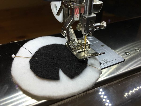 How to sew Stubby the Squid - Place, pin, and zig-zag stitch black pupils