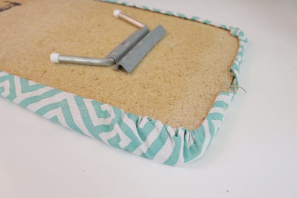 Mini ironing board cover Step Nine: secure cover to board