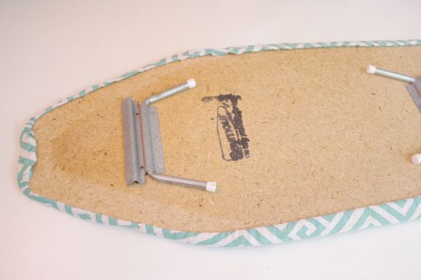 Mini ironing board cover Step Nine: secure cover to board