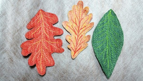 Free-motion stitched fall leaves