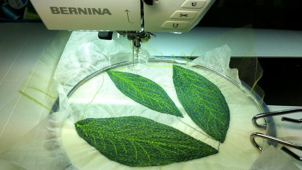 Free-motion stitched fall leaves