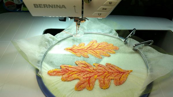 Free-motion stitched fall leaves