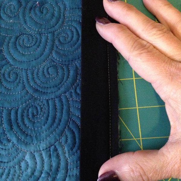 Moon Wall Hanging-binding at the front of the quilt