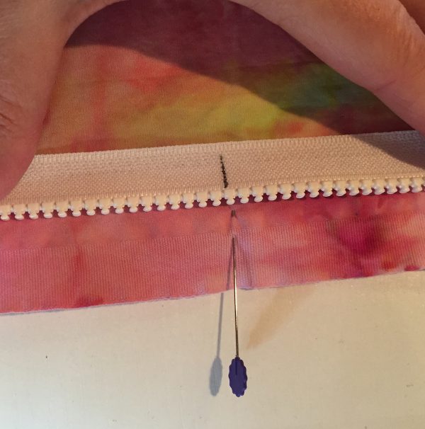 Match center of backing with center of zipper