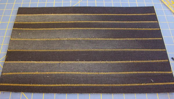 Jeans Composition Book Cover-Secure strips in place with a zigzag stitch