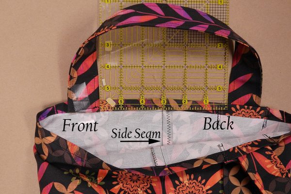 Easy Convertible Totebag/Backpack Tutorial Step 15: Sew the ends of the straps to the top inside edge of the opposite side of the tote.
