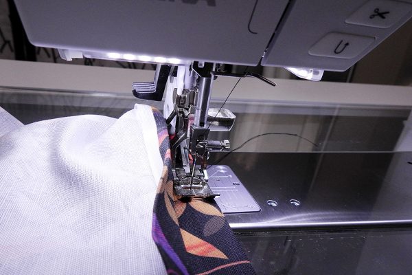 Easy Convertible Totebag/Backpack Tutorial Step 11: Turn down top edge twice, then topstitch.