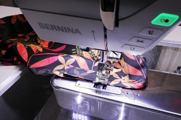 Easy Convertible Totebag/Backpack Tutorial Step 13: Sew strap carriers to the top edge of the outside of the bag.