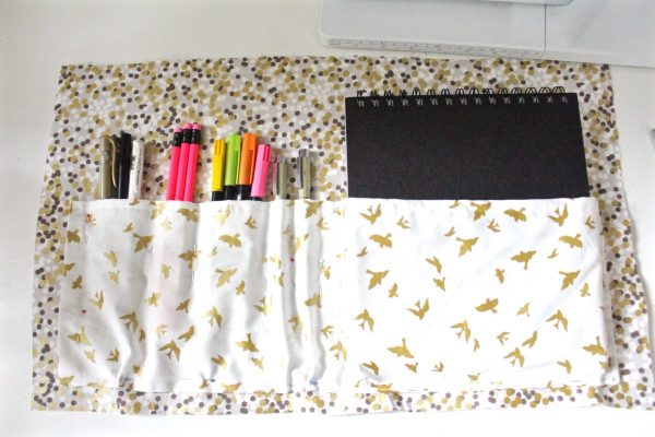 DIY Sketchbook and pen case Step six: Use pins to divide the pocket