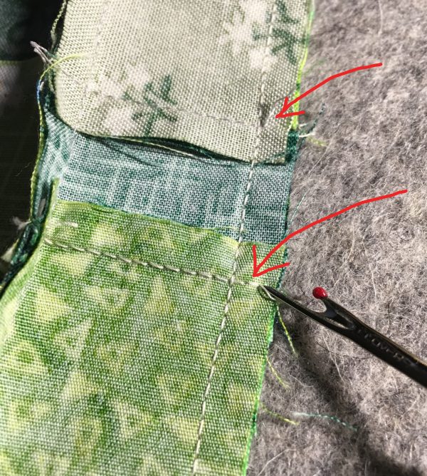 Shamrock Table Runner-With a seam ripper, remove the two or three stitches between the seam