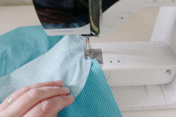 step five: sew the bottom fabric to the sides