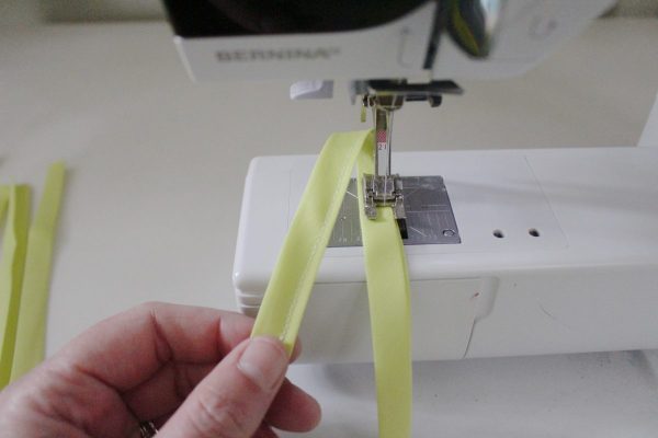 step fourteen: sew open edge of bias tape together
