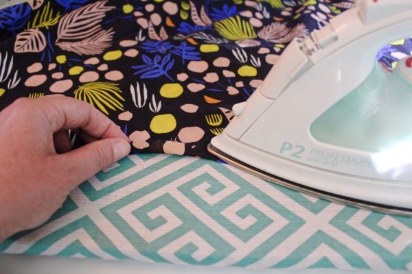 step 23: Add a side hem for the open edges of the skirt
