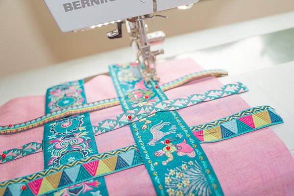 top stitch the ribbon to the pillow top