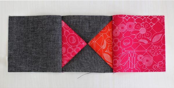 Piecing, Seam a gray square to an orange, pink and gray square unit and then this unit to a pink square