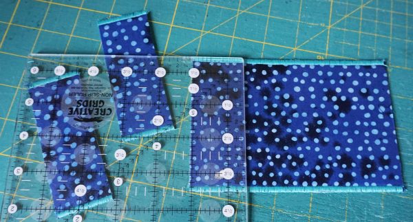 cut the larger rectangle into strips