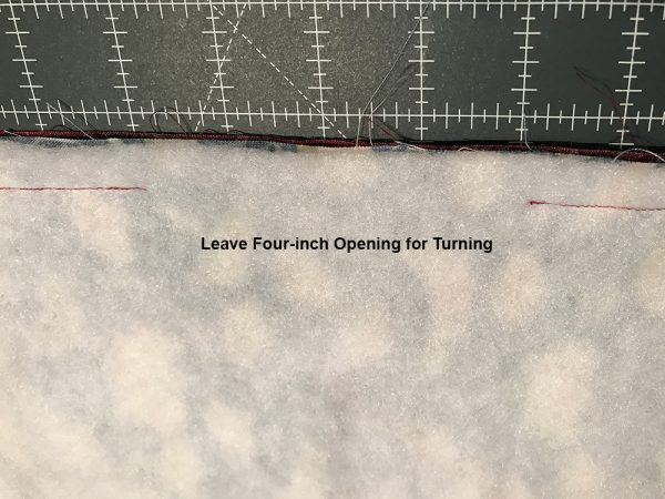 leave a four-inch (4”) opening on the narrow sides of your fabric sandwich