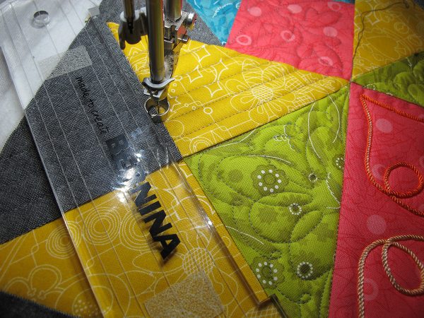 stitch remaining four sets of 3 triangles with a straight edge ruler