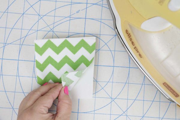 Shamrock Door Hanger In the Hoop step two: press applique to fusible web