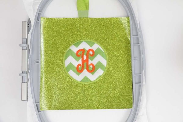 shamrock door hanger in the hoop Step 6, Sew Monogram, sew letter monogram
