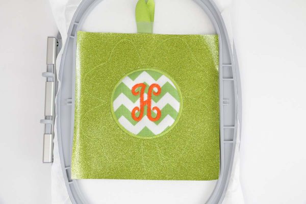 Shamrock door hanger in the hoop Step 7, Attach Back: sew final stitch, running stitch. 