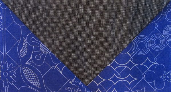 Stitch 2 Fabric C triangles to a large Fabric D triangle