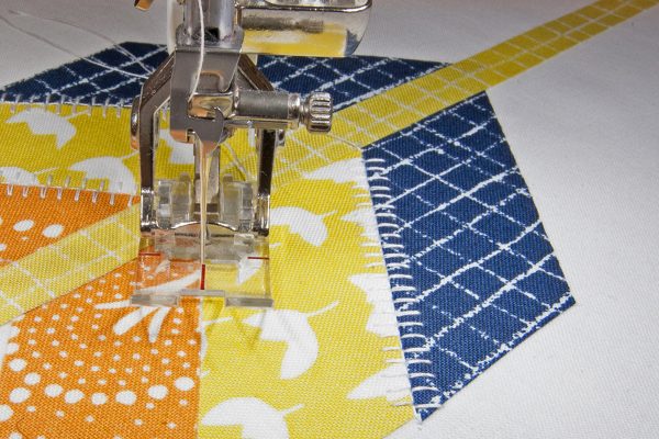 Stitching with the BERNINA Reverse Pattern foot with clear sole # 34D